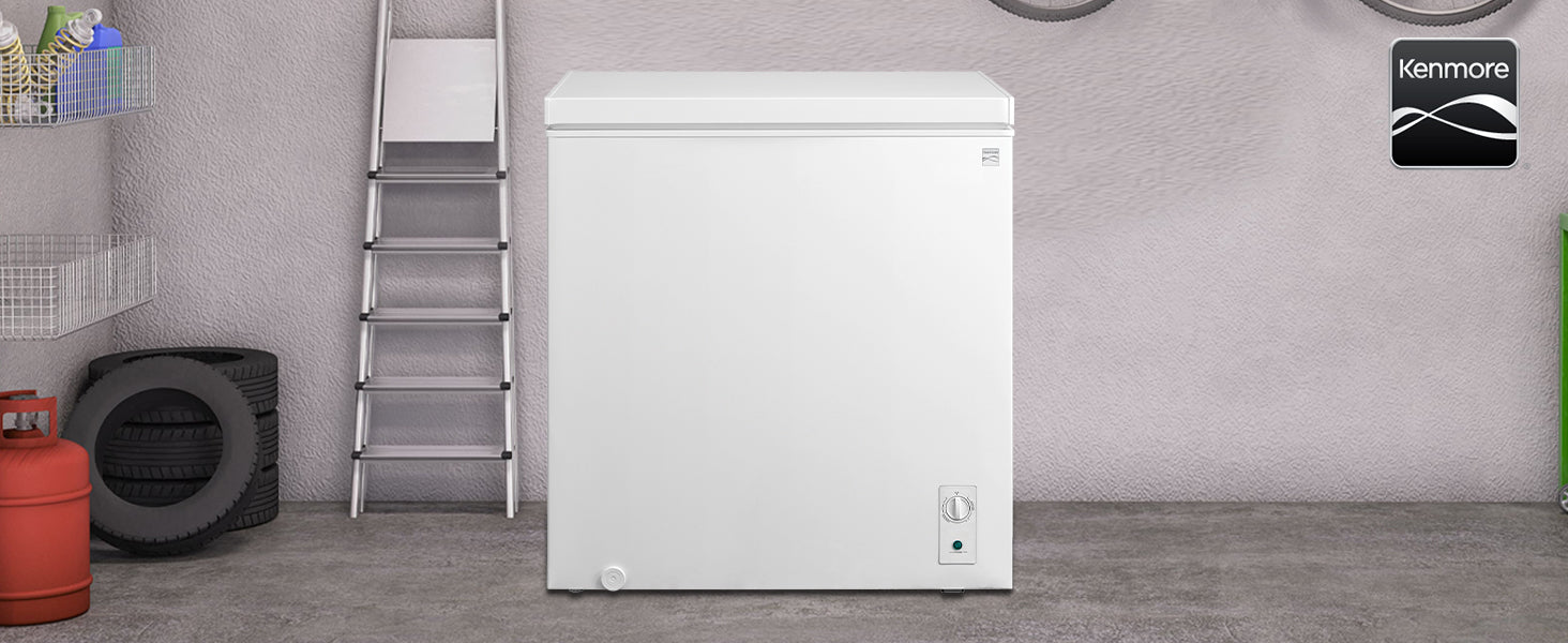 Kenmore 7 cubic foot convertible chest freezer refrigerator in a light gray garage