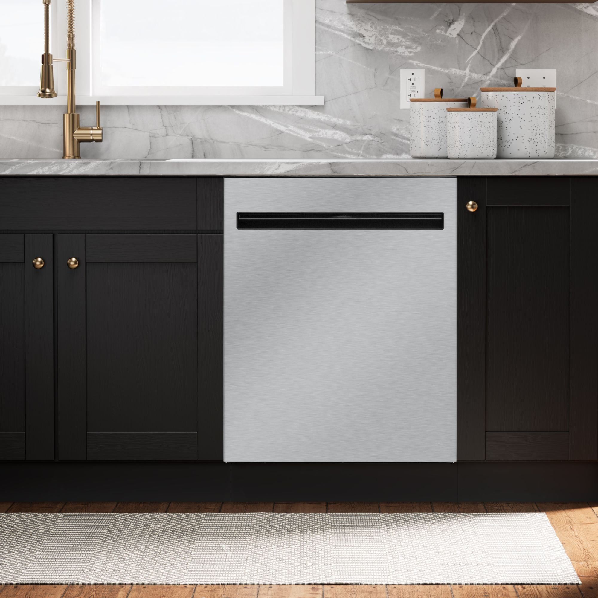 Kenmore ultra-quiet 24-inch top control dishwasher installed in a bright kitchen with black cabinets