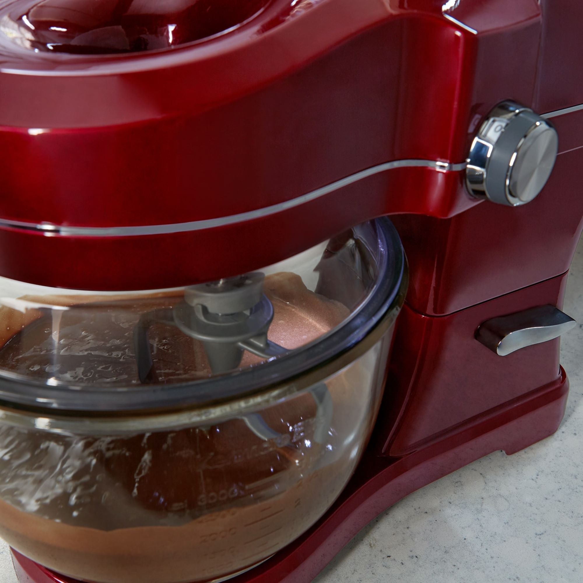 Closeup of the Kenmore Elite Ovation mixer with the bowl filled with chocolate brownie batter