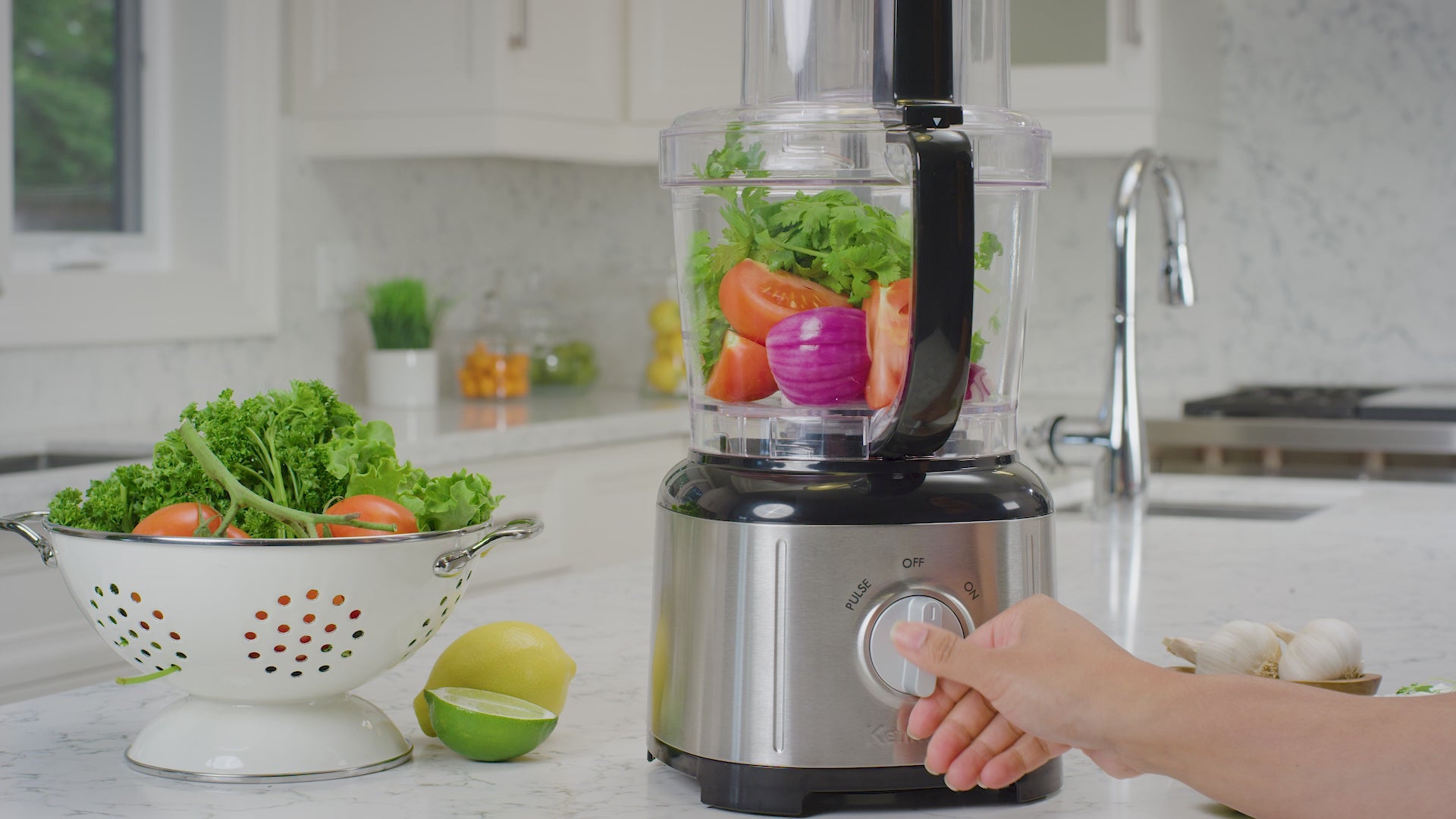 Video with music in the background demonstrates the parts and features of the Kenmore 11 cup food processor and vegetable chopper