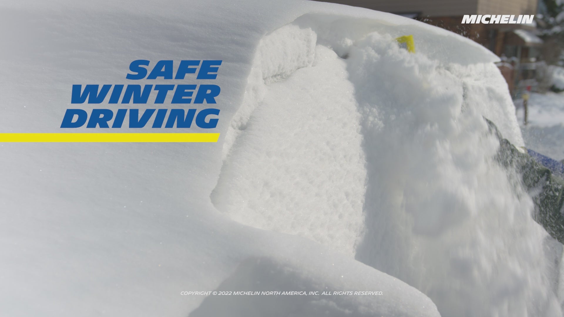 Video shows snow brush being used to clear a thick layer of snow off a red SUV. Text overlay reads, "Safe winter driving begins with visibility"